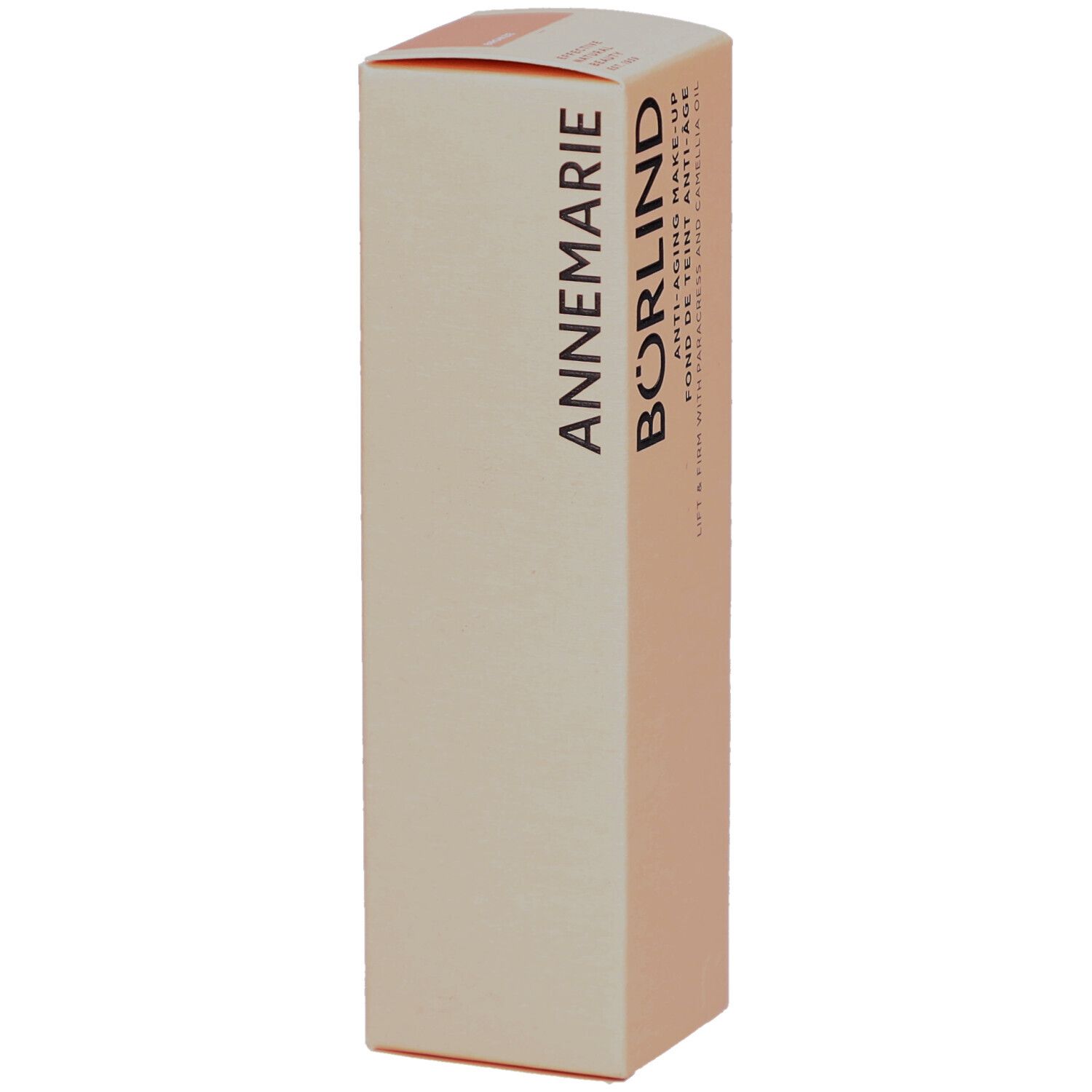 Beige Kartonverpackung. Text: ANNEMARIE BÖRLIND. Anti-Aging Make-up. Fond de teint anti-âge. Lift & Firm mit Parakresse und Kamelienöl.