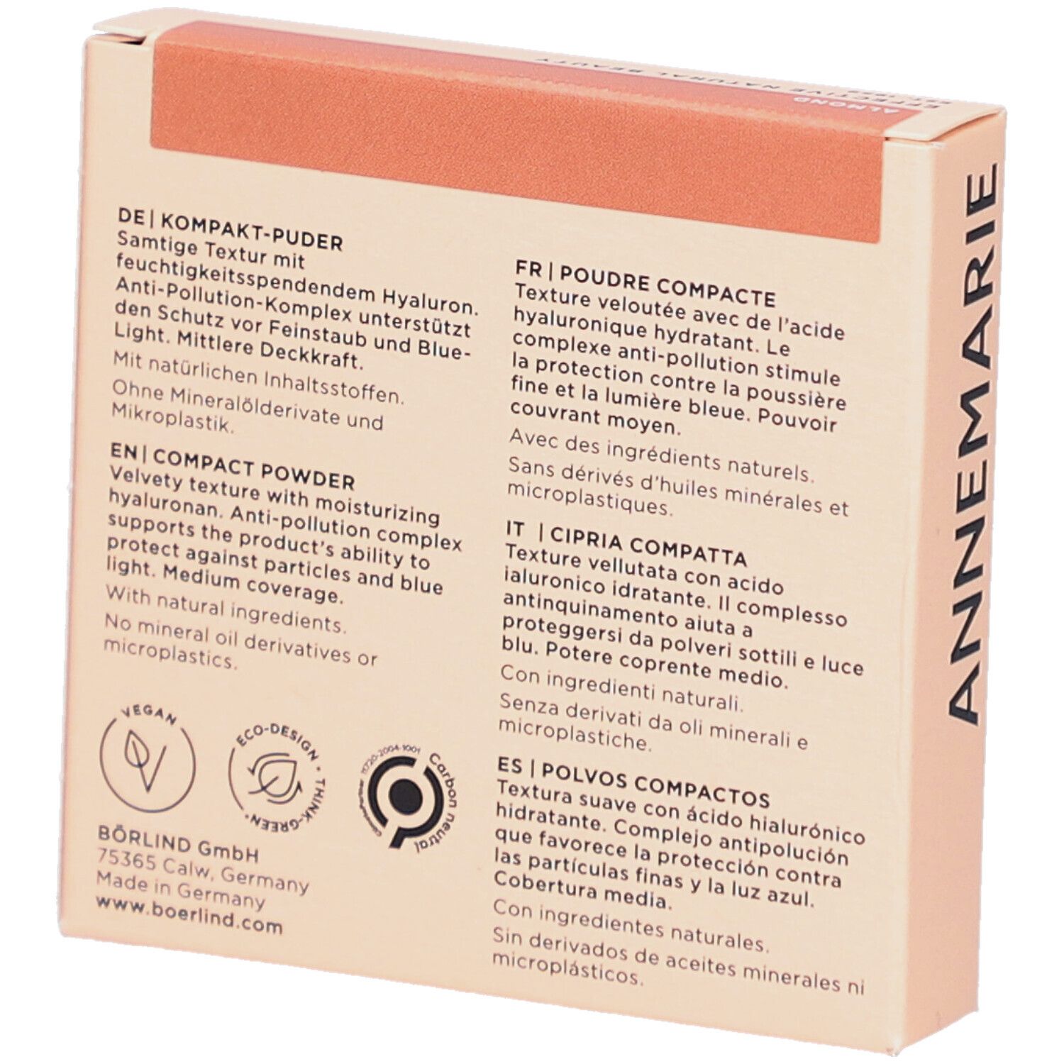 Rückseite der Kompakt-Puder-Verpackung. Text in Deutsch, Französisch, Italienisch und Spanisch. Vegan-Logo.