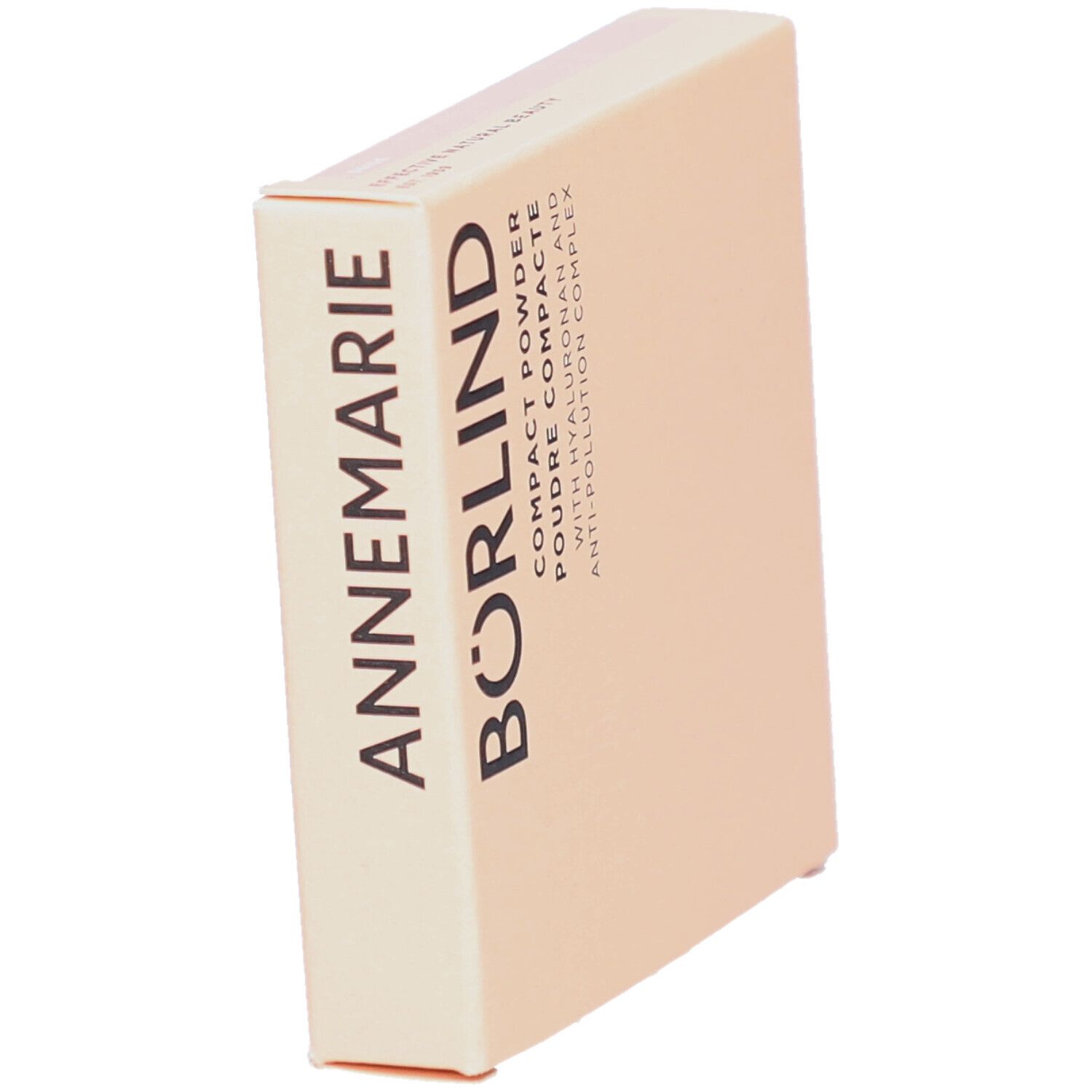 Kompaktpuder-Verpackung. Beige Karton mit Schriftzug ANNEMARIE BÖRLIND. Text: Compact Powder, Poudre Compacte, mit Hyaluron und Anti-Pollution Complex.