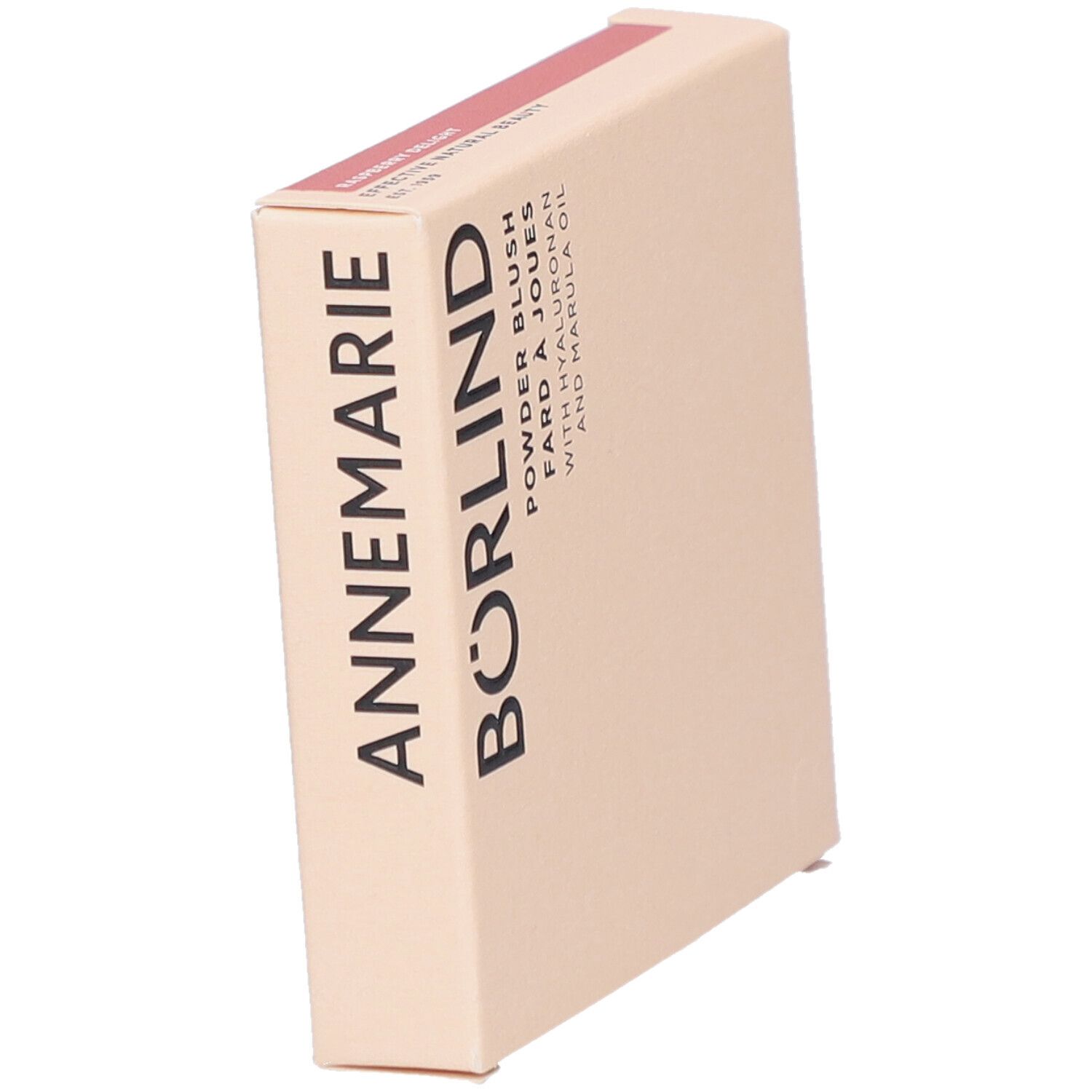 Schräg stehende, beige Kartonverpackung. Aufschrift: ANNEMARIE BÖRLIND, Powder Blush, Fard à Joues, mit Hyaluron und Marulaöl.