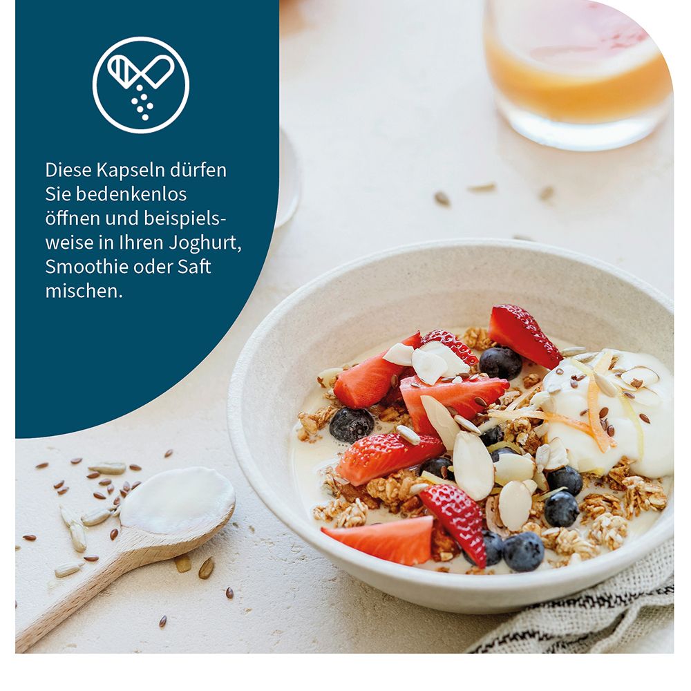 Schüssel mit Joghurt, Beeren und Müsli. Löffel. Text: Kapseln in Joghurt, Smoothie oder Saft mischen.