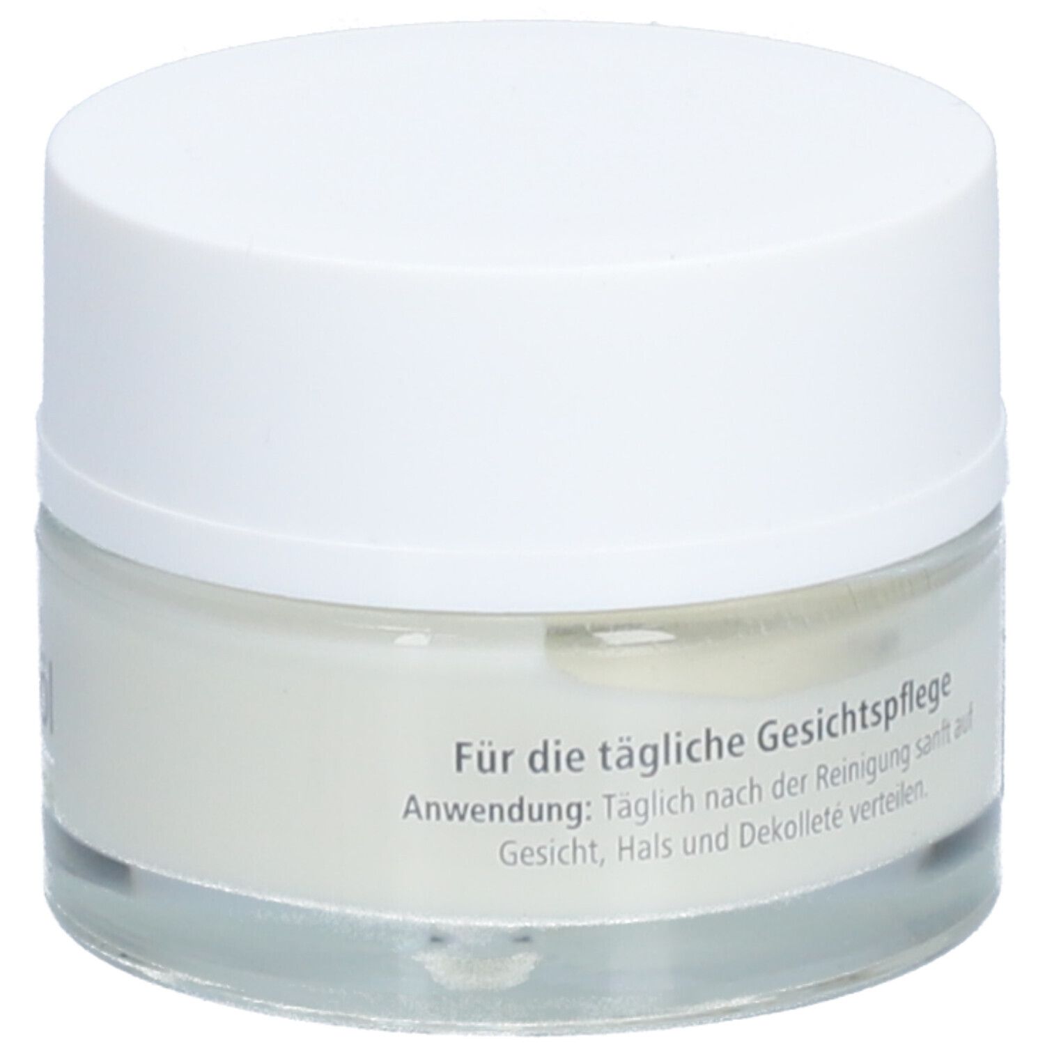Creme-Tiegel mit weißem Deckel. Aufgedruckt sind Informationen zur täglichen Gesichtspflege und Anwendung.