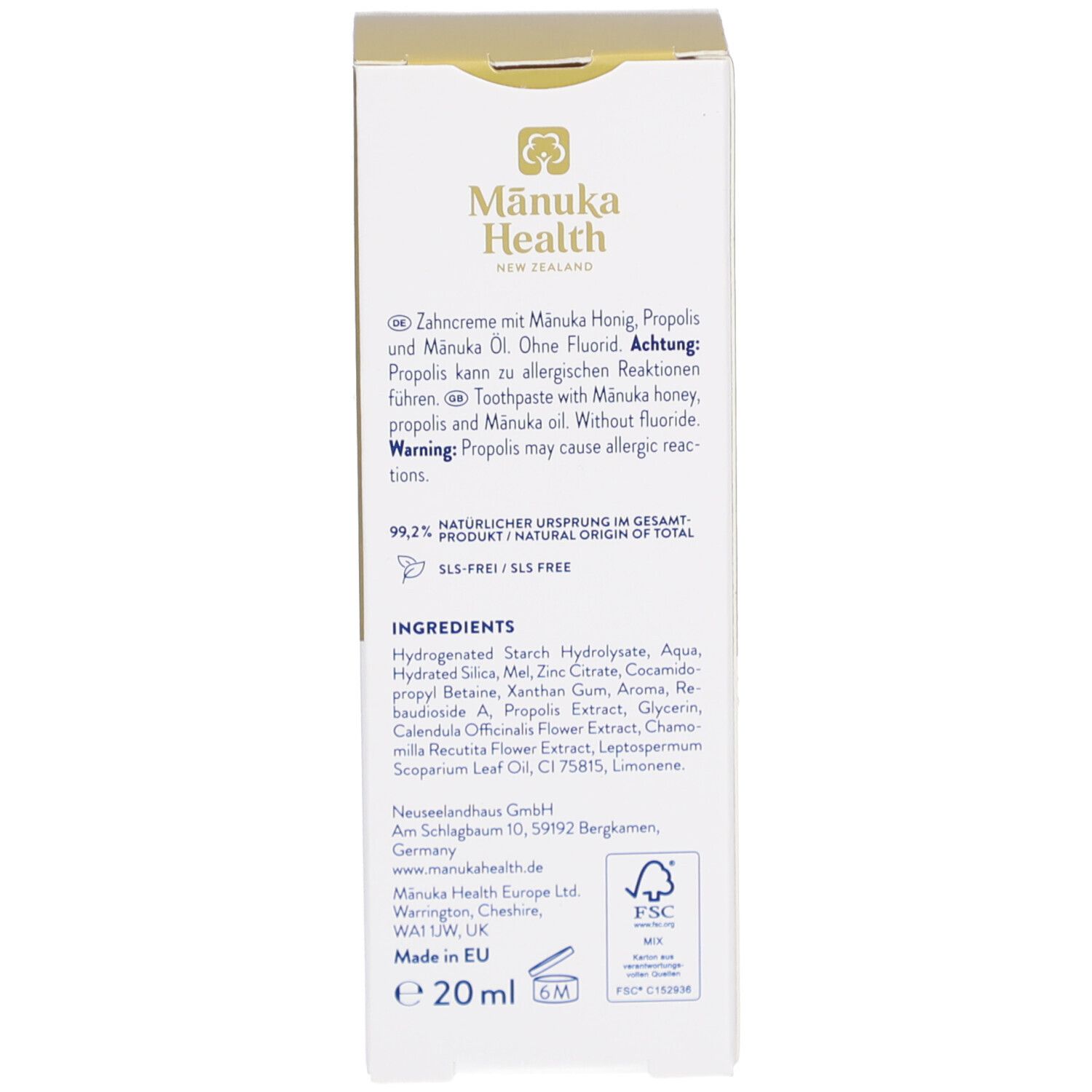 Rückseite der Kartonverpackung. Enthält Text in Deutsch und Englisch. Informationen zu Inhaltsstoffen, Hersteller und Zertifizierungen.