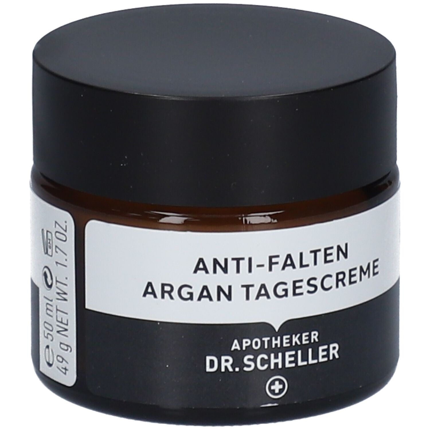 Braunes Creme-Glas mit schwarzem Deckel. Produktname und Logo auf dem Etikett. Vegan-Siegel.