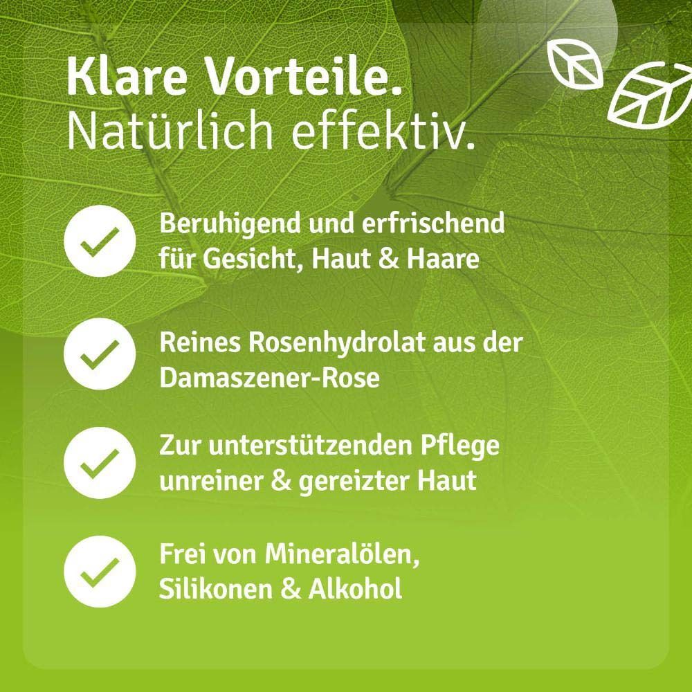 Grüner Hintergrund mit Text: Beruhigend und erfrischend, Rosenhydrolat, Pflege für unreine Haut, ohne Mineralöle.