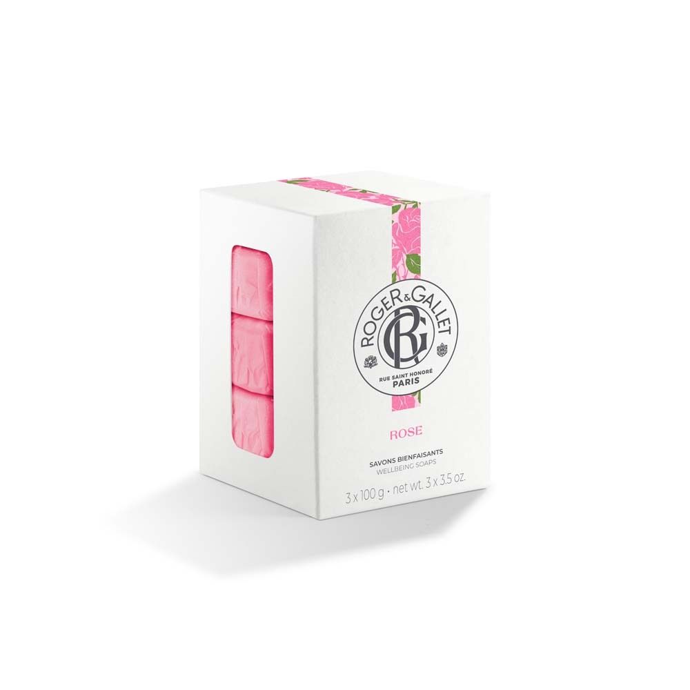 Weißer Karton mit drei rosa Seifen. ROGER&GALLET Logo und "Rose" Schriftzug. Verpackung mit floralem Muster.