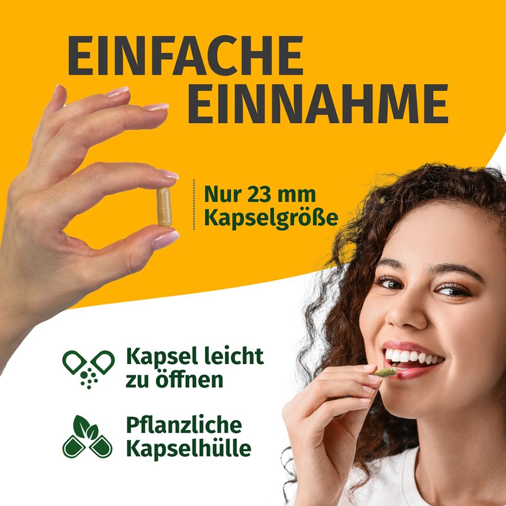 Frau nimmt Kapsel. Einfache Einnahme, nur 23 mm Kapselgröße. Pflanzliche Kapselhülle.
