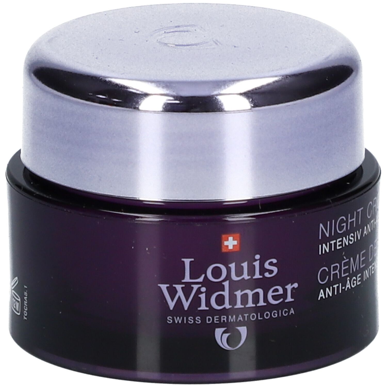 Dunkelviolettes Tiegel mit silbernem Deckel. Aufschrift: Night Cream, Crème de Nuit, Louis Widmer, Swiss Dermatologica.