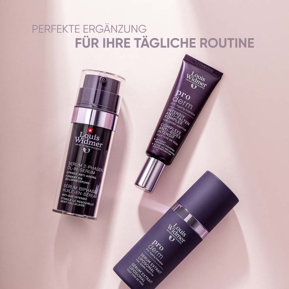 Drei Produkte: Flasche, Serum und Tube. Aufschrift: Louis Widmer, pro derm. Auf rosa Untergrund.