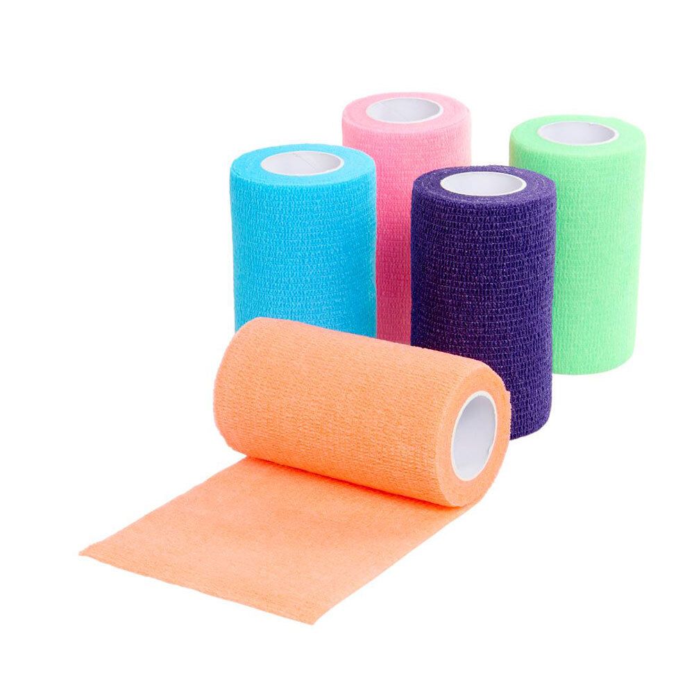 Mehrfarbige Bandagenrollen. Eine Rolle ist abgerollt. Farben: Blau, Pink, Lila, Grün und Orange.