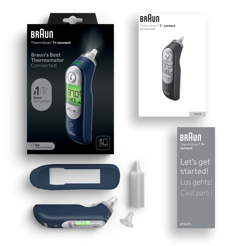 Produktverpackung und Zubehör. Ohrthermometer, Schutzhülle, Ersatzspitzen, Anleitung. Marke Braun.