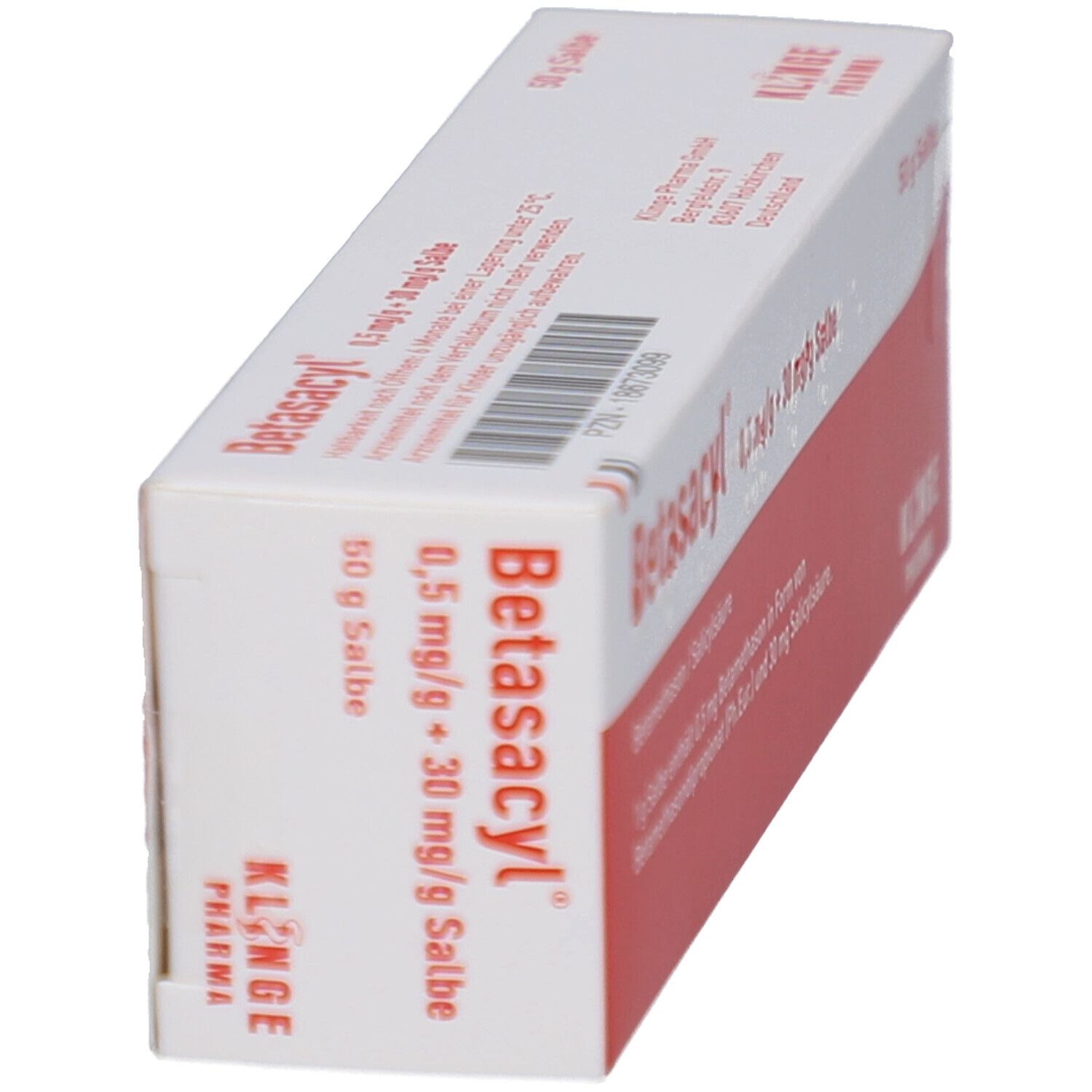 Schräg stehende Faltschachtel. Aufschrift: Betasacyl 0,5 mg/g + 30 mg/g Salbe. Klinge Pharma. Rote und weiße Farbgebung.
