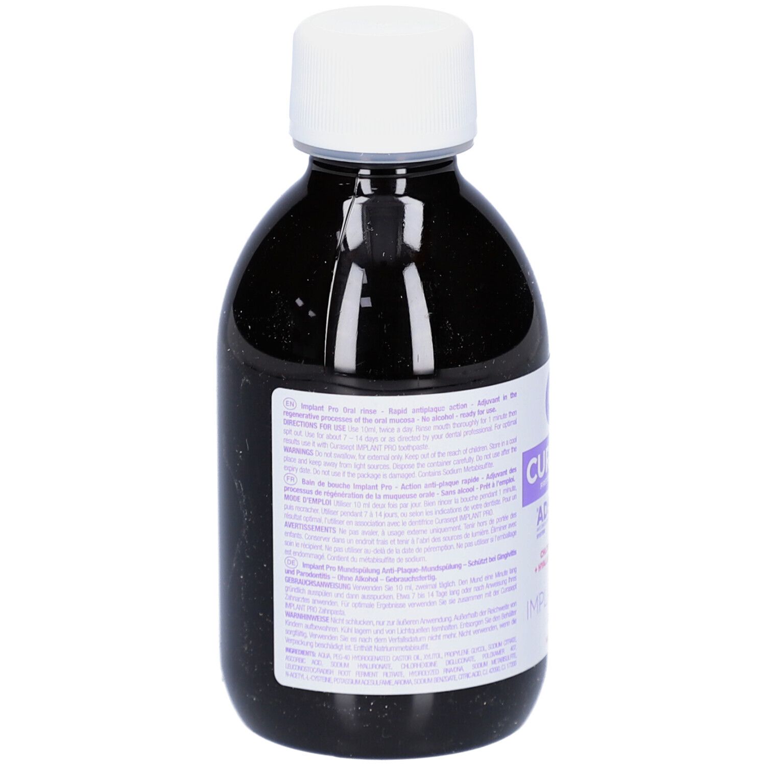 Dunkle Flasche mit weißem Deckel. Aufkleber mit Text. Produktname nicht sichtbar.