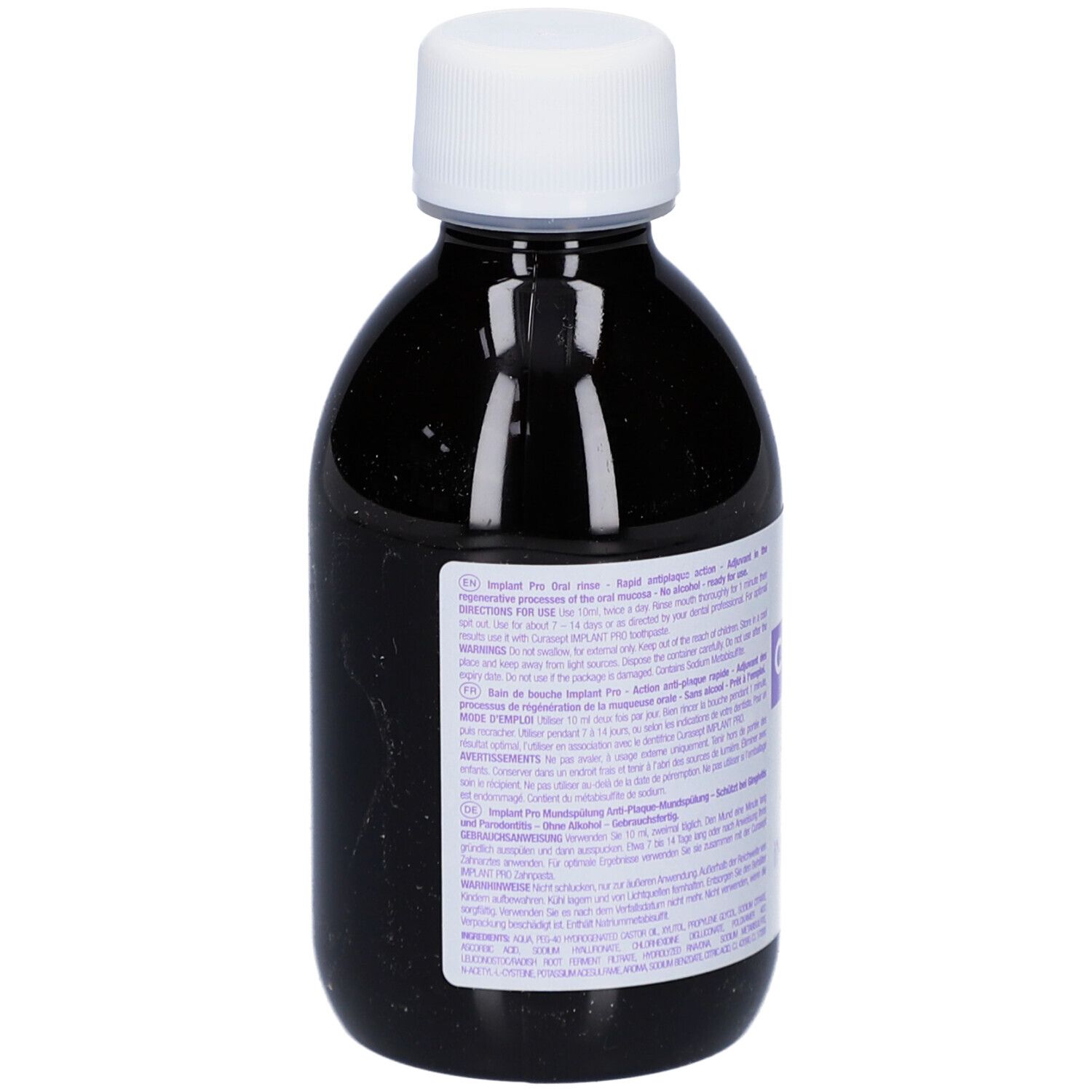 Dunkle Flasche mit weißem Deckel. Aufkleber mit Text. Produktname nicht sichtbar.