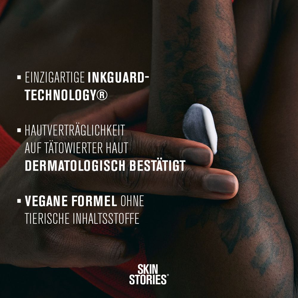 SKIN STORIES Tattoo Daily Lotion Farberhalt LSF 10 Tube, Vorderansicht mit blauen Akzenten und Text.