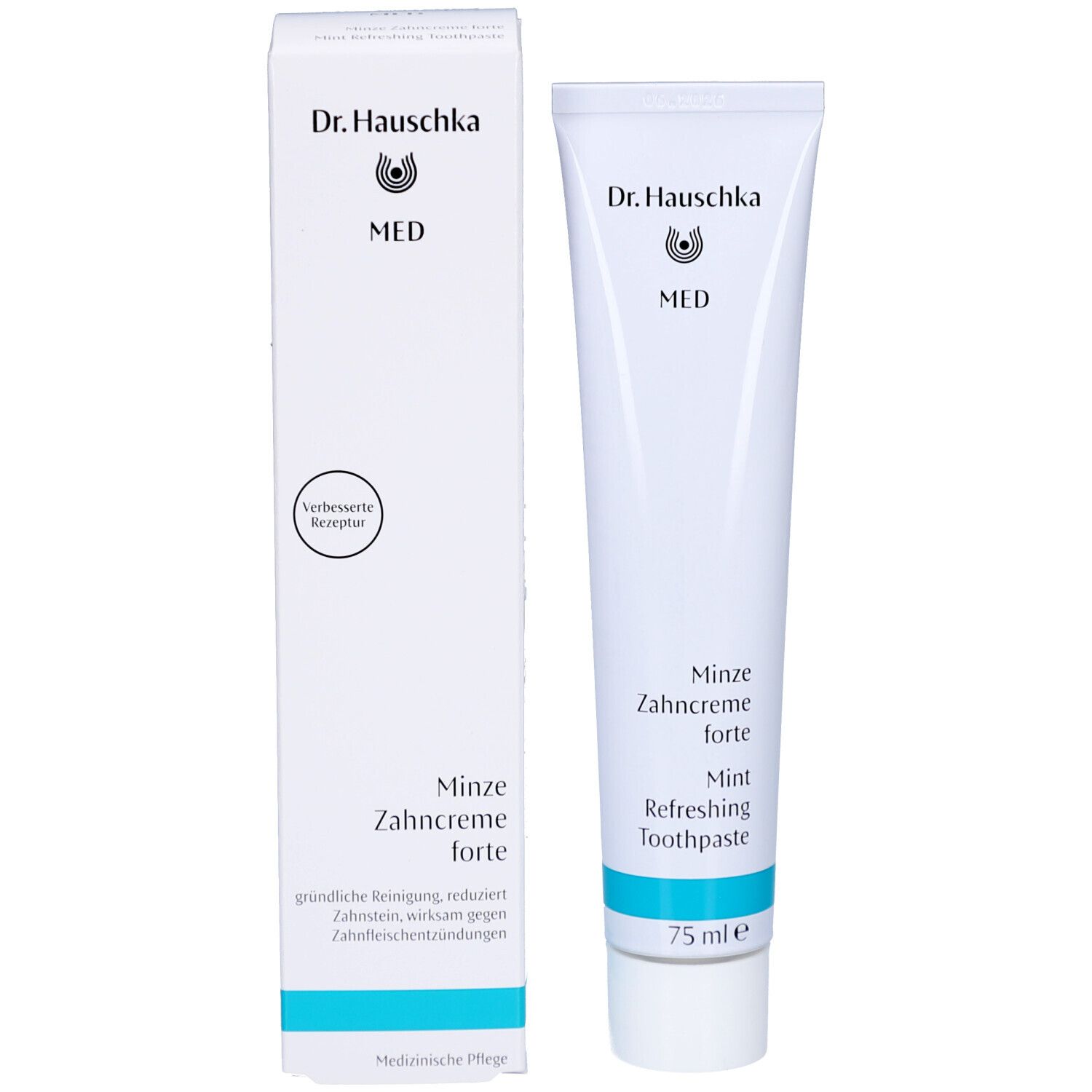 Zahnpasta-Tube und Schachtel. Aufschrift: Dr. Hauschka MED, Minze Zahncreme forte, Mint Refreshing Toothpaste. Weiße Verpackung.