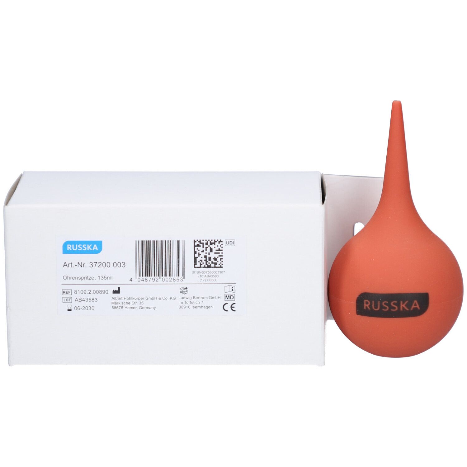 Rote Ohrenspritze mit spitzem Aufsatz und Verpackung. Verpackung mit RUSSKA-Logo.