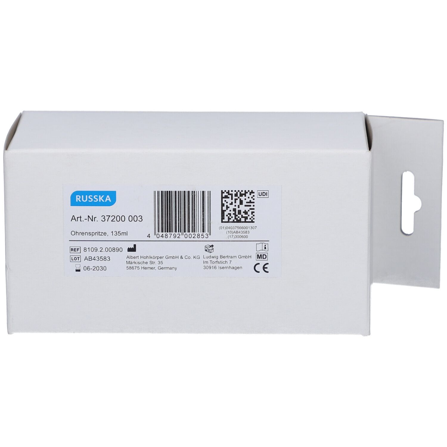 Weiße Verpackung mit Produktinformationen. RUSSKA-Logo und Artikelnummer.