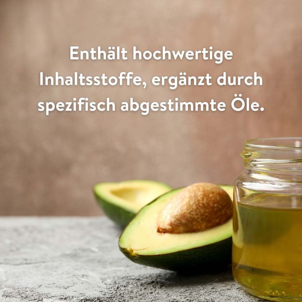 Avocado und Öl in einem Glas. Text: Enthält hochwertige Inhaltsstoffe, ergänzt durch spezifisch abgestimmte Öle.