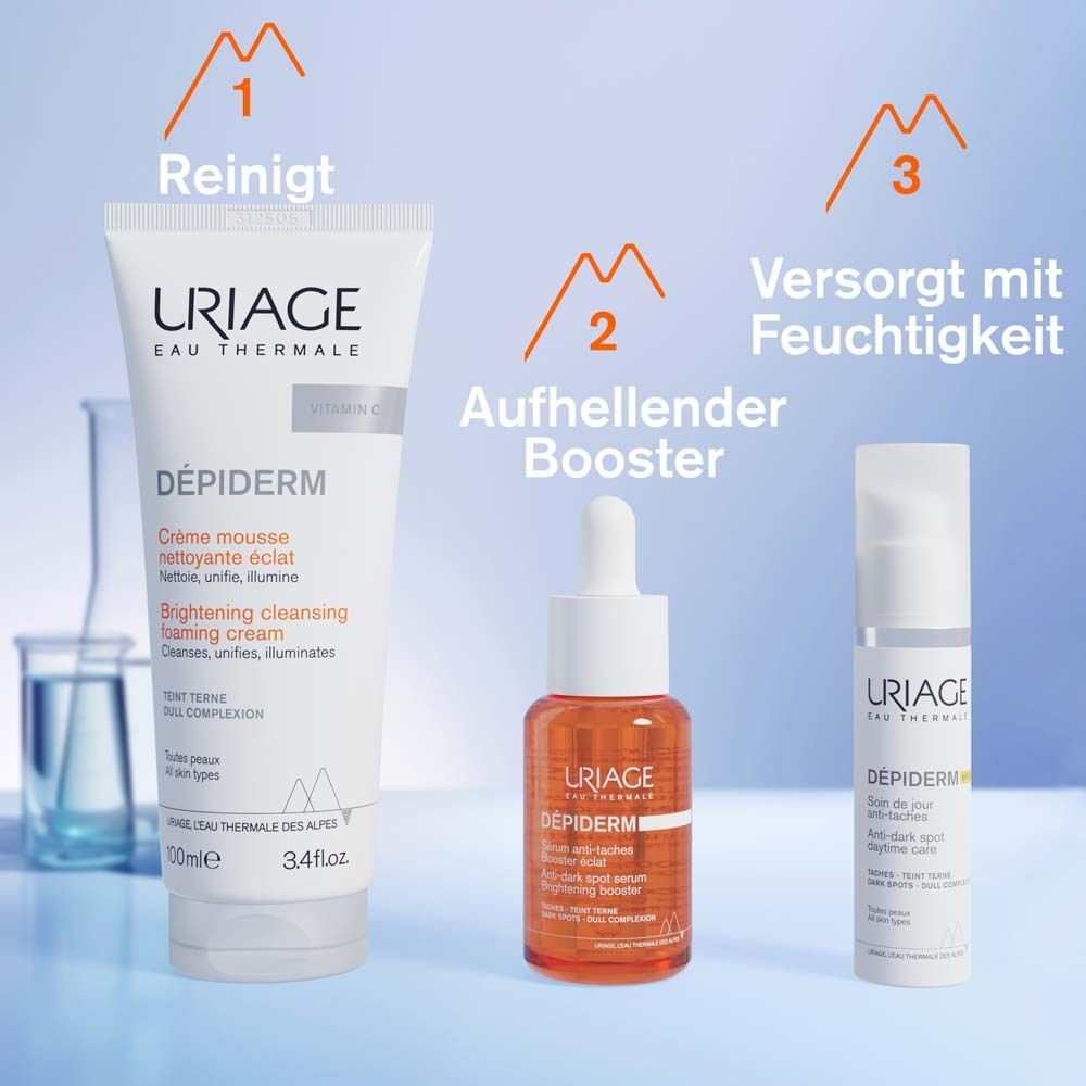 Drei Produkte: Reinigungsschaum, Aufhellender Booster, Tagespflege. URIAGE DÉPIDERM.