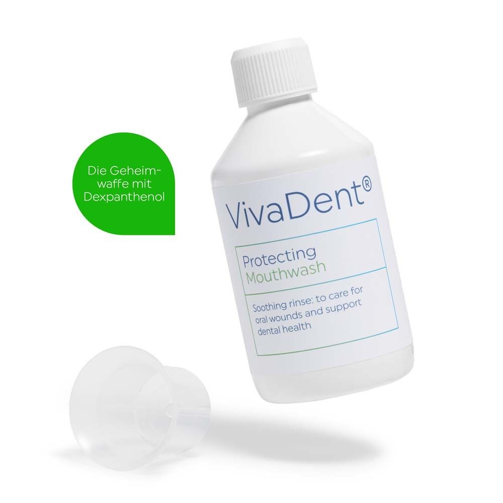 Weiße Flasche VivaDent Protecting Mouthwash mit Deckel und separatem Messbecher. Grüner Aufkleber mit Text.
