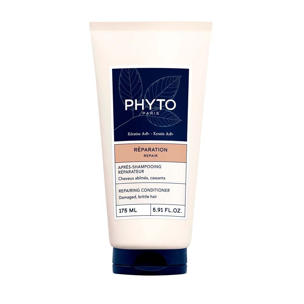 Creme-farbene Tube mit blauem Deckel. Aufdruck: PHYTO PARIS, Réparation, Repairing Conditioner. Inhalt: 175 ml.