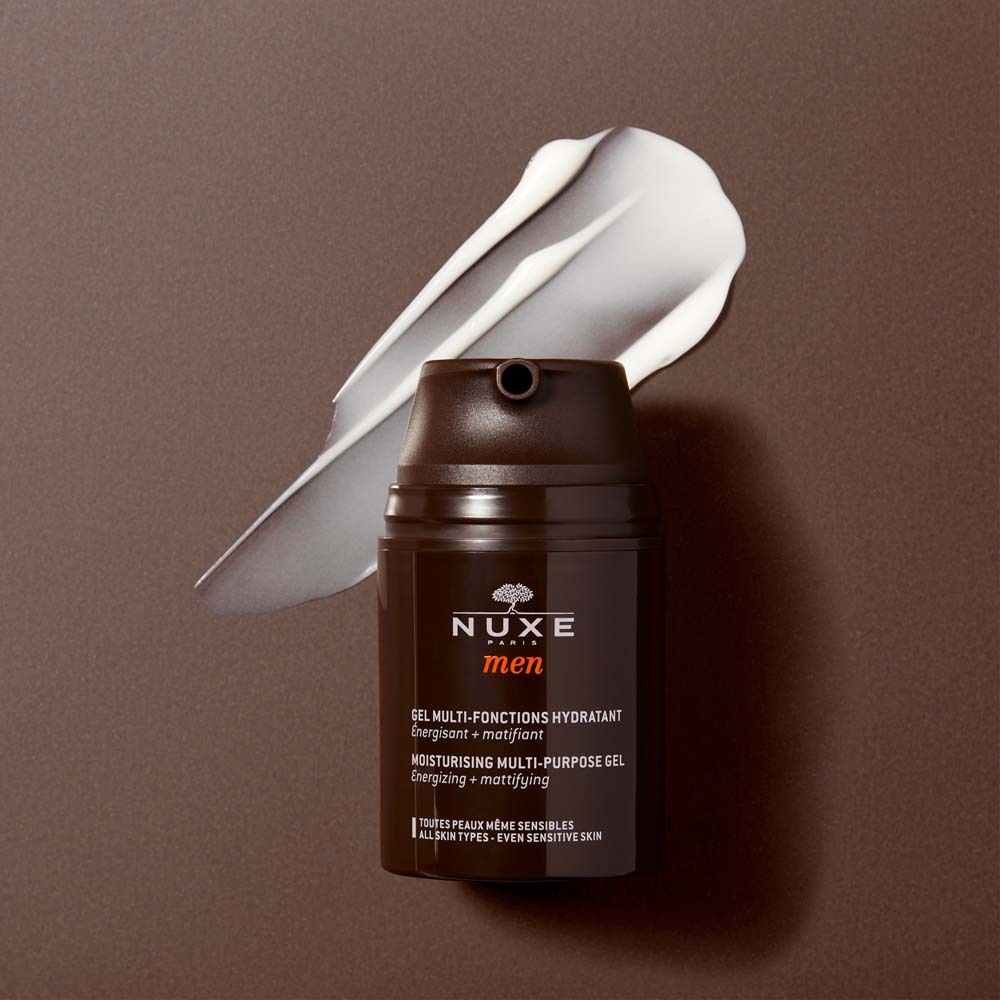 NUXE Men Feuchtigkeitspflege. Braune Flasche mit weißer Creme. Text: 'Gel Multi-Fonctions Hydratant'.