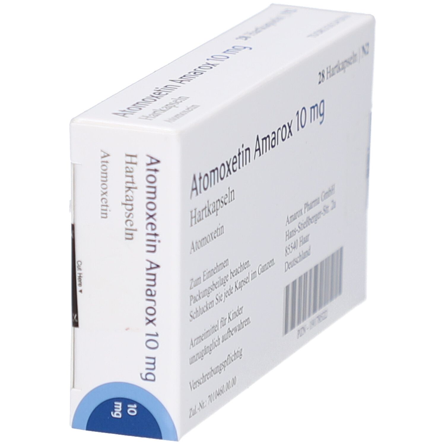 Schräg gestellte Arzneimittelverpackung mit Aufschrift Atomoxetin Amarox 10 mg Hartkapseln. Blaue Kreise.