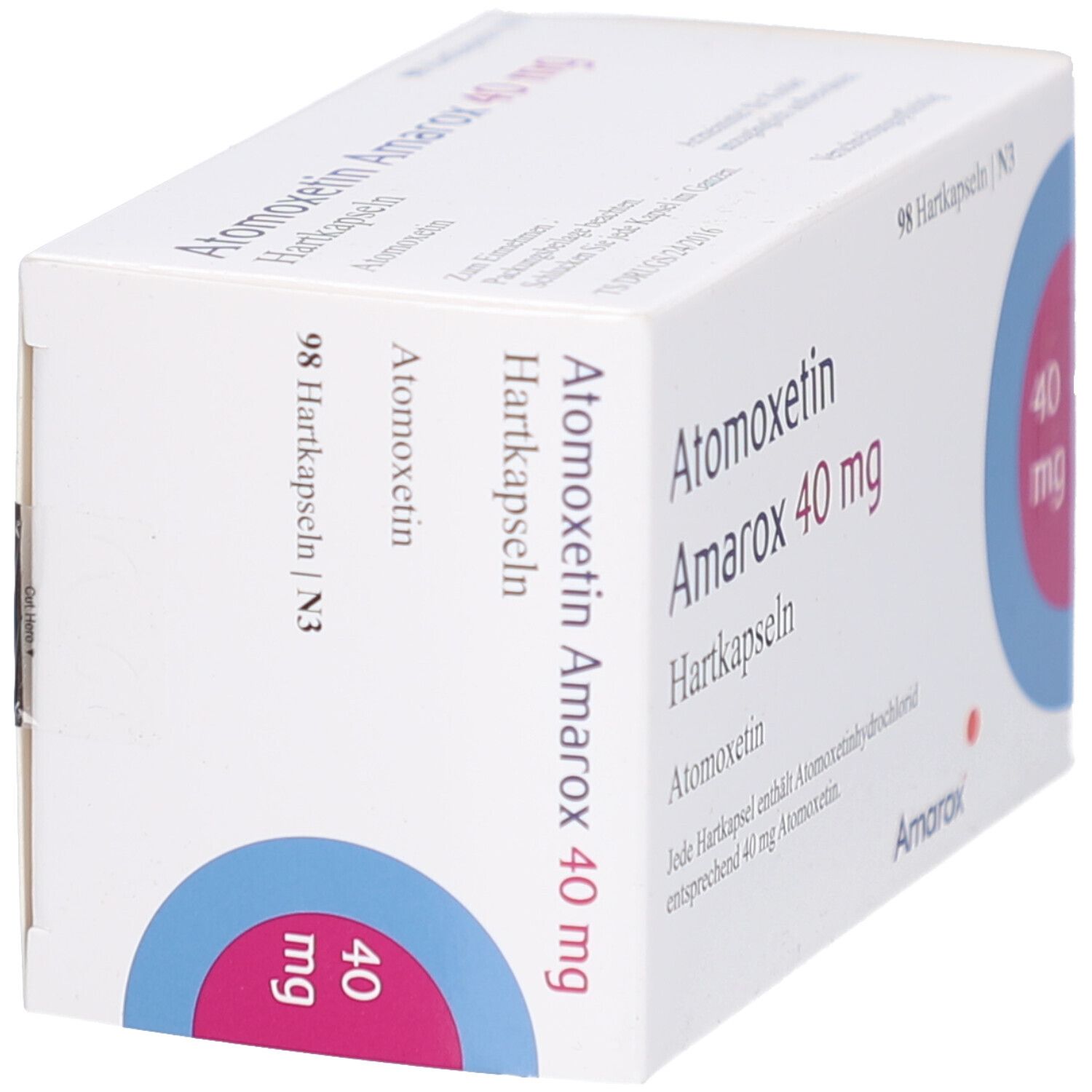 Weiße Arzneimittelverpackung. Aufschrift: Atomoxetin Amarox 40 mg Hartkapseln. Enthält 98 Hartkapseln. Logo Amarox. Blaue und pinkfarbene Kreise.