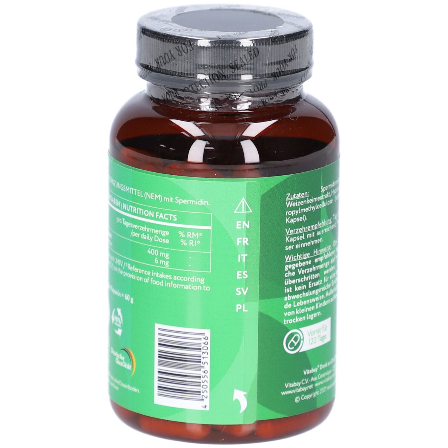 Rückseite der Flasche. Grüne Banderole mit Nährwertangaben und Text in mehreren Sprachen.