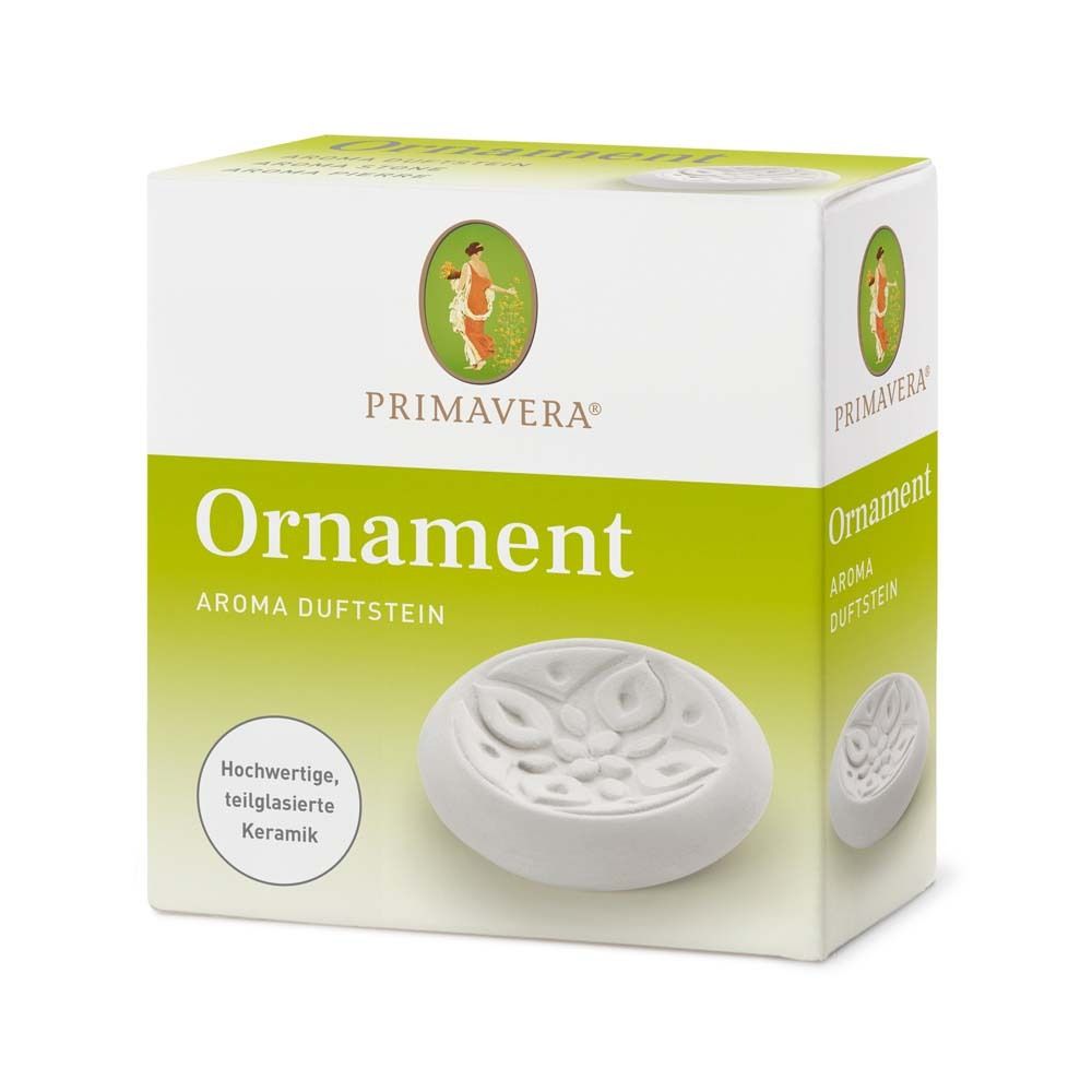 Weißer, ovaler Aroma-Duftstein aus Keramik in Verpackung. Aufschrift: Primavera, Ornament, Aroma Duftstein.