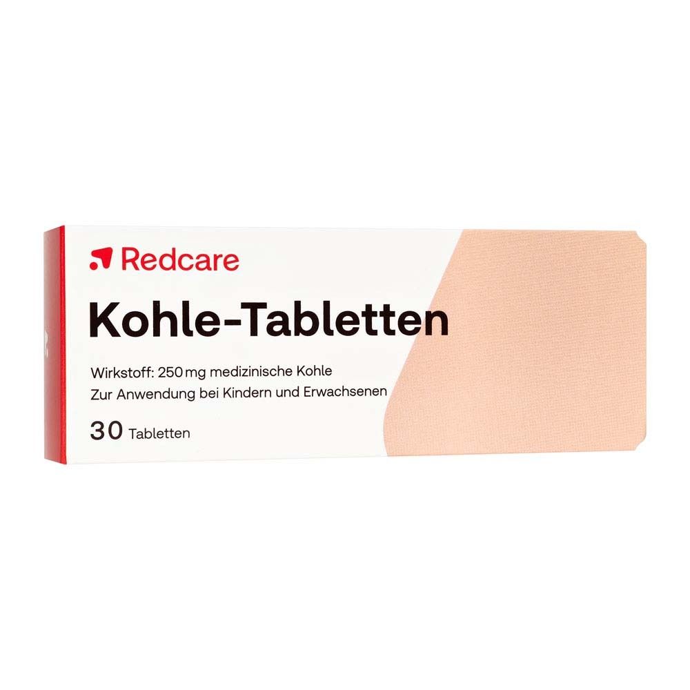 Weiße Schachtel mit rotem Logo und Aufschrift 'Redcare Kohle-Tabletten'. Enthält 30 Tabletten. Text: 250 mg medizinische Kohle.