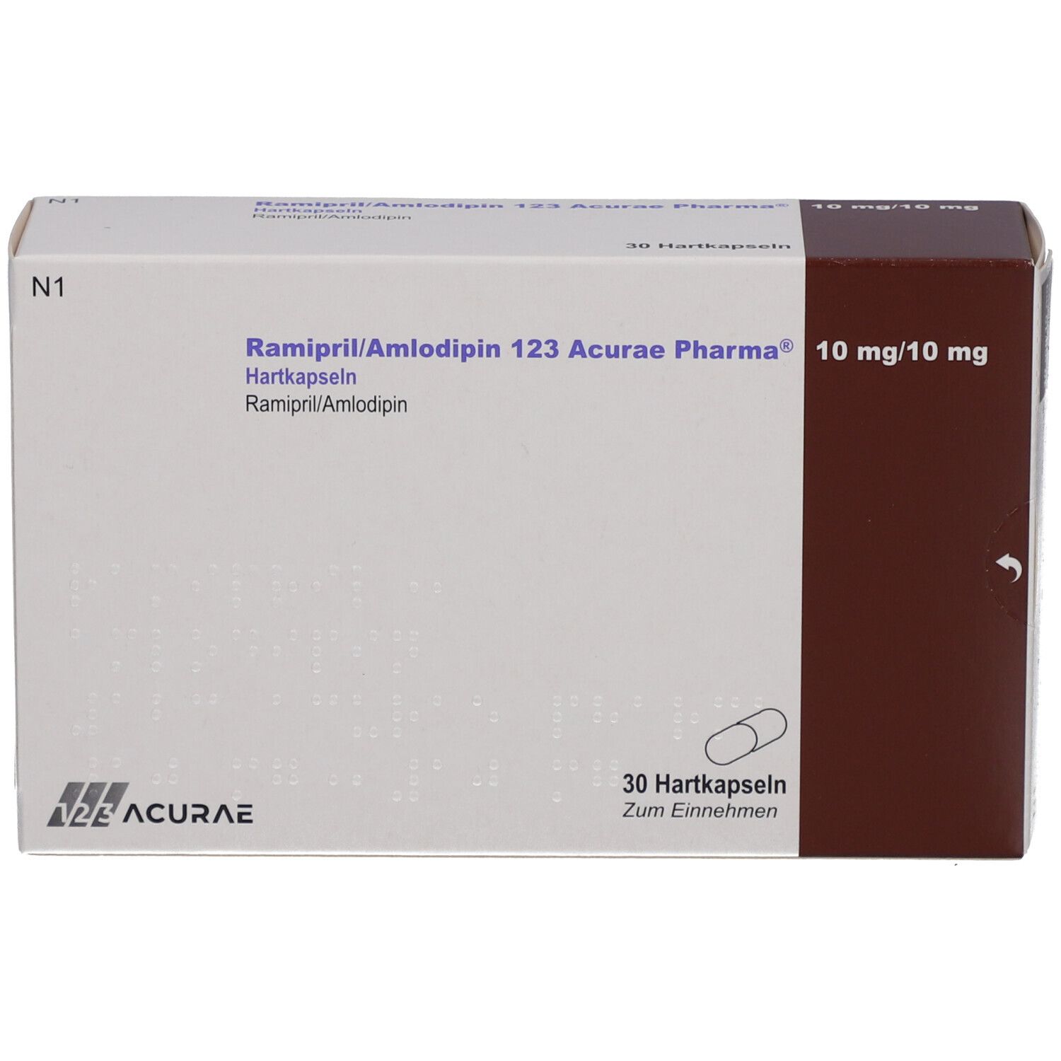 Medikamentenbox. Aufschrift: Ramipril/Amlodipin 123 Acurae Pharma 10mg/10mg. 30 Hartkapseln. Weiße Verpackung mit brauner Seite.