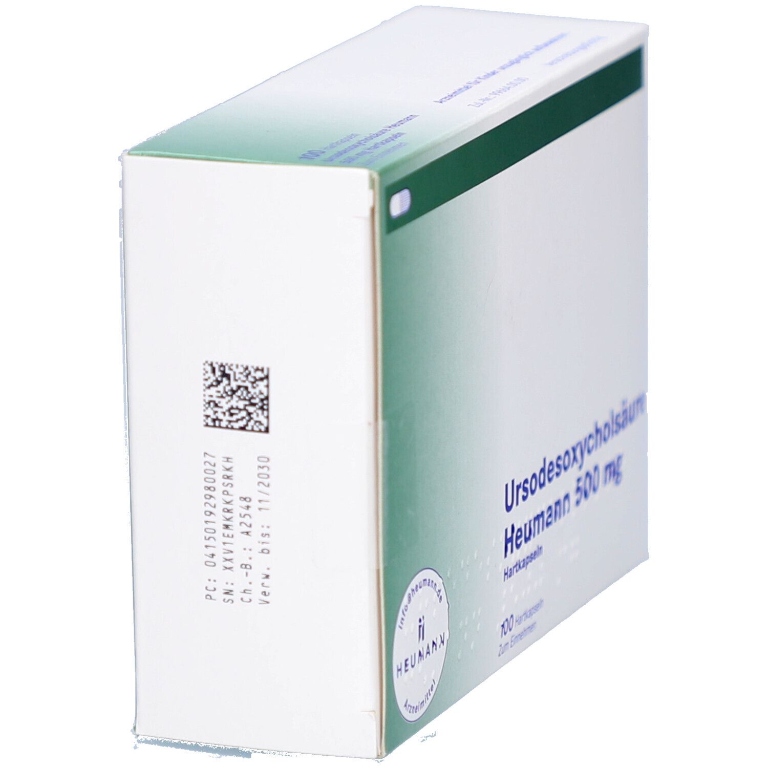 Kartonverpackung, Seitenansicht. Text: Ursodesoxycholsäure Heumann 500 mg. Barcode und Chargennummer. Grüner Streifen.