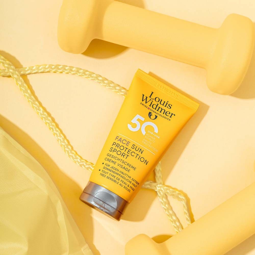 Gelbe Tube Louis Widmer 50+ mit Sport-Zubehör. Gesichtsschutz Sport. Schweissresistent.