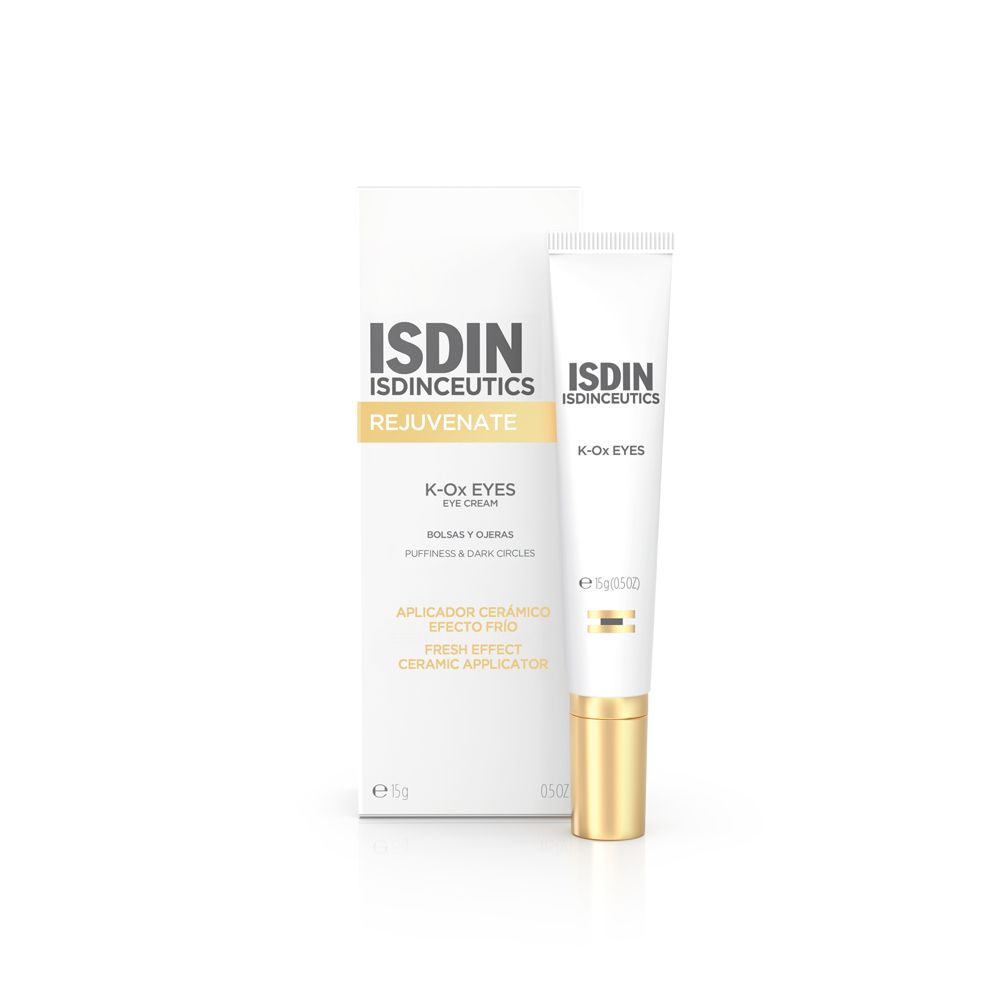 Isdin Isdinceutics K-ox Eyes Augencreme in weißer Tube mit goldener Kappe und Faltschachtel.