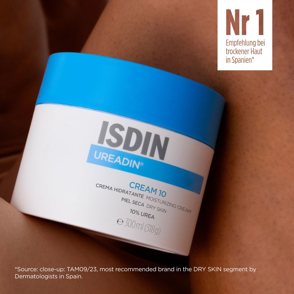 Creme-Dose mit blauem Deckel. Aufschrift: ISDIN UREADIN CREAM 10. Text: Empfehlung bei trockener Haut in Spanien.