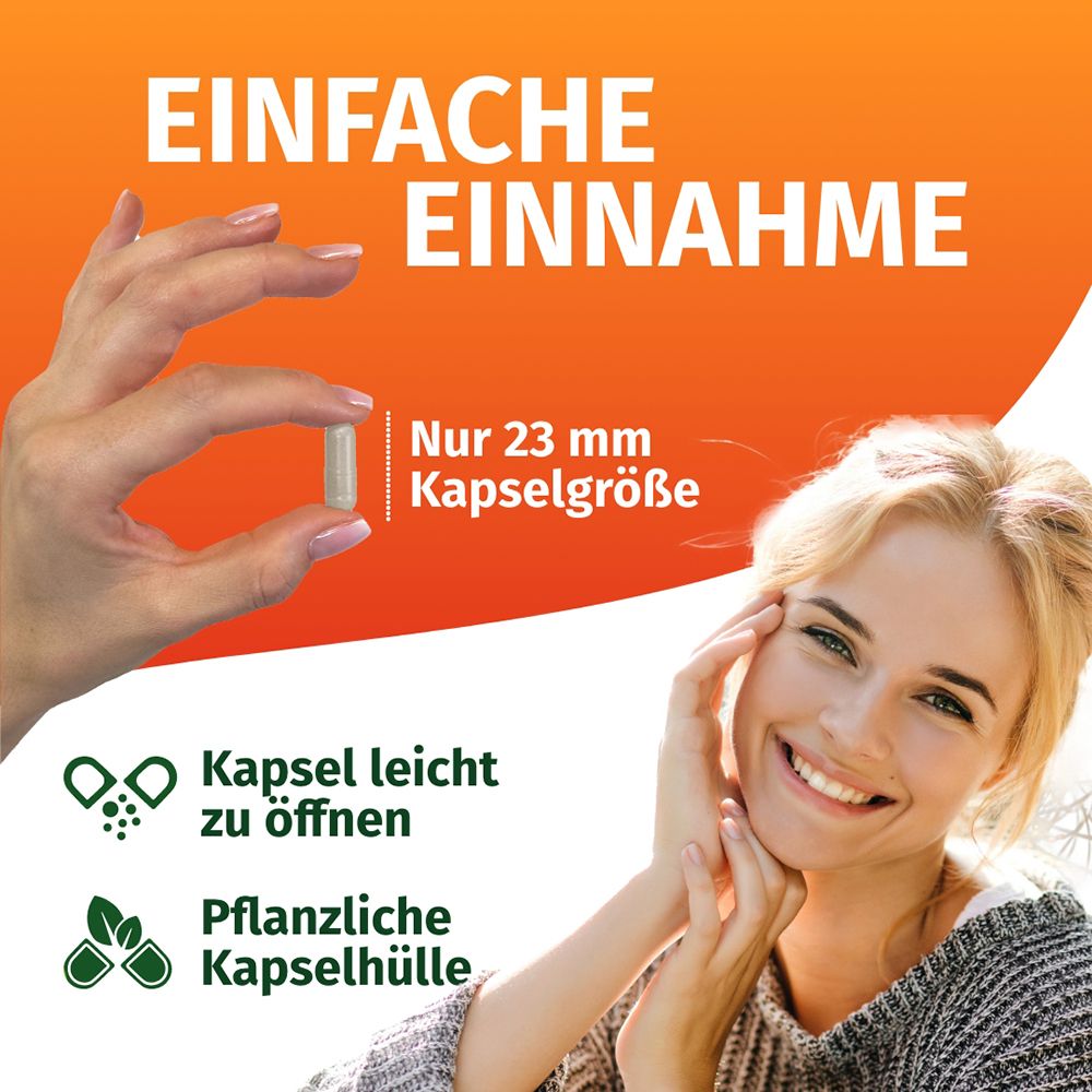 Frau hält eine Kapsel, die leicht zu öffnen ist. Kapselgröße 23 mm.