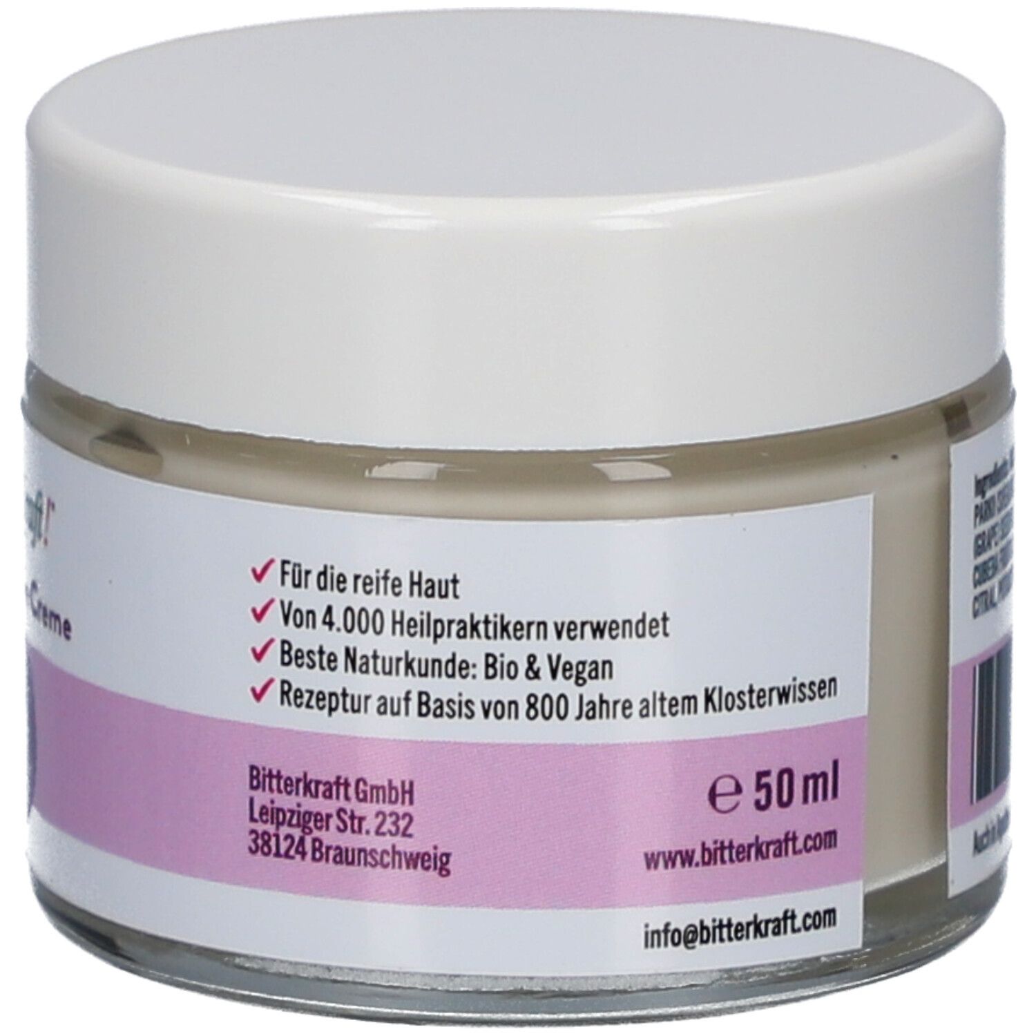 Rückseite des Creme-Glases. Auf dem Etikett stehen Informationen, Inhaltsstoffe und Kontaktinformationen.  Ebenfalls sichtbar: 50 ml.