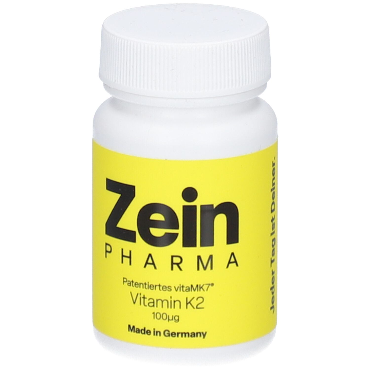 Weiße Flasche mit gelbem Etikett. Aufschrift: Zein Pharma, Vitamin K2 100µg, Made in Germany. Text: Jeder Tag ist Deiner.