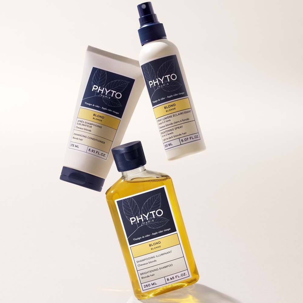 Drei Produkte: Spray, Shampoo und Spülung. Aufschrift PHYTO PARIS, BLOND. Enthält Apfelessig. Verpackung in Weiß und Gelb.