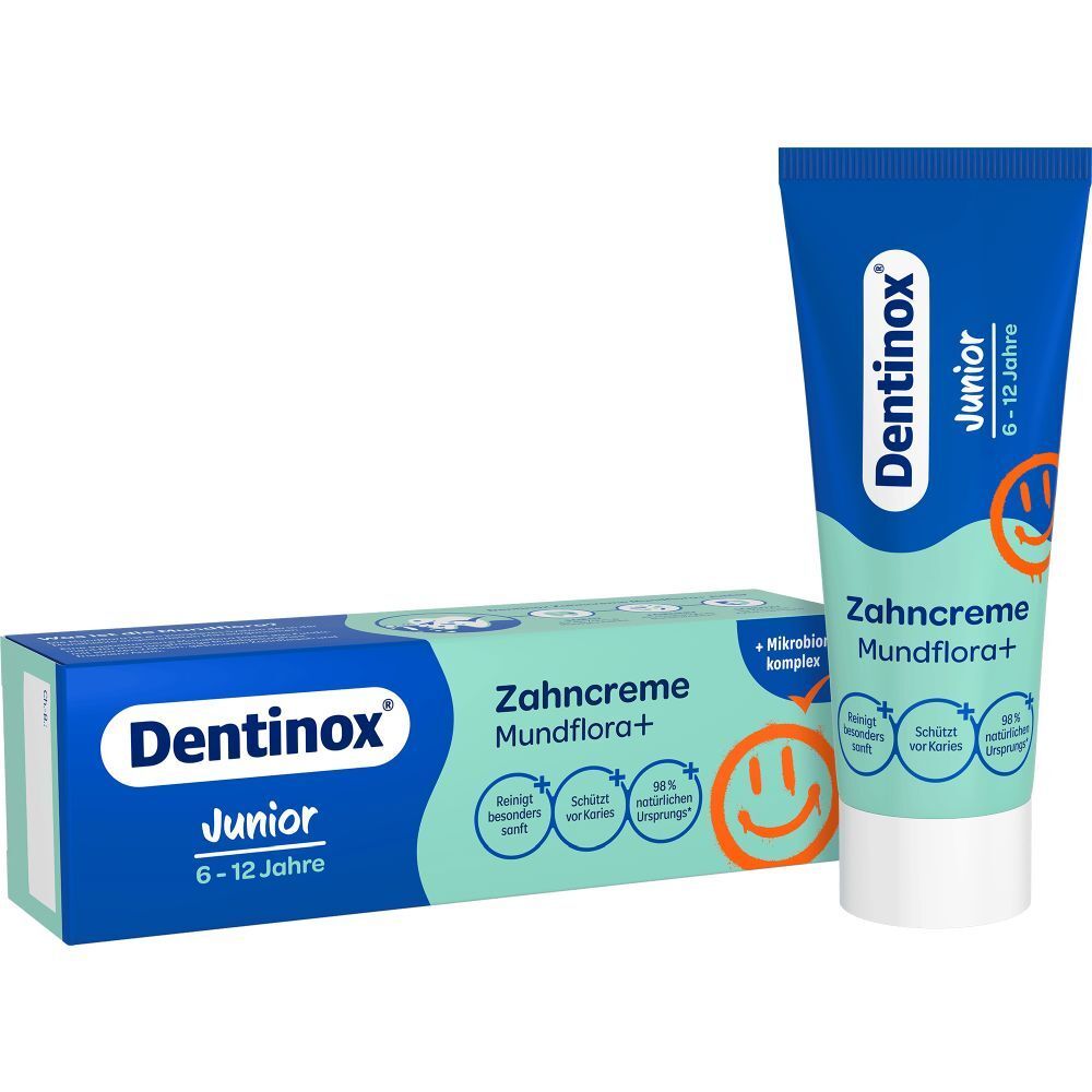 Zahncreme-Tube und Schachtel. Aufschrift: Dentinox Junior, Zahncreme Mundflora+, 6-12 Jahre. Tube und Schachtel stehen.