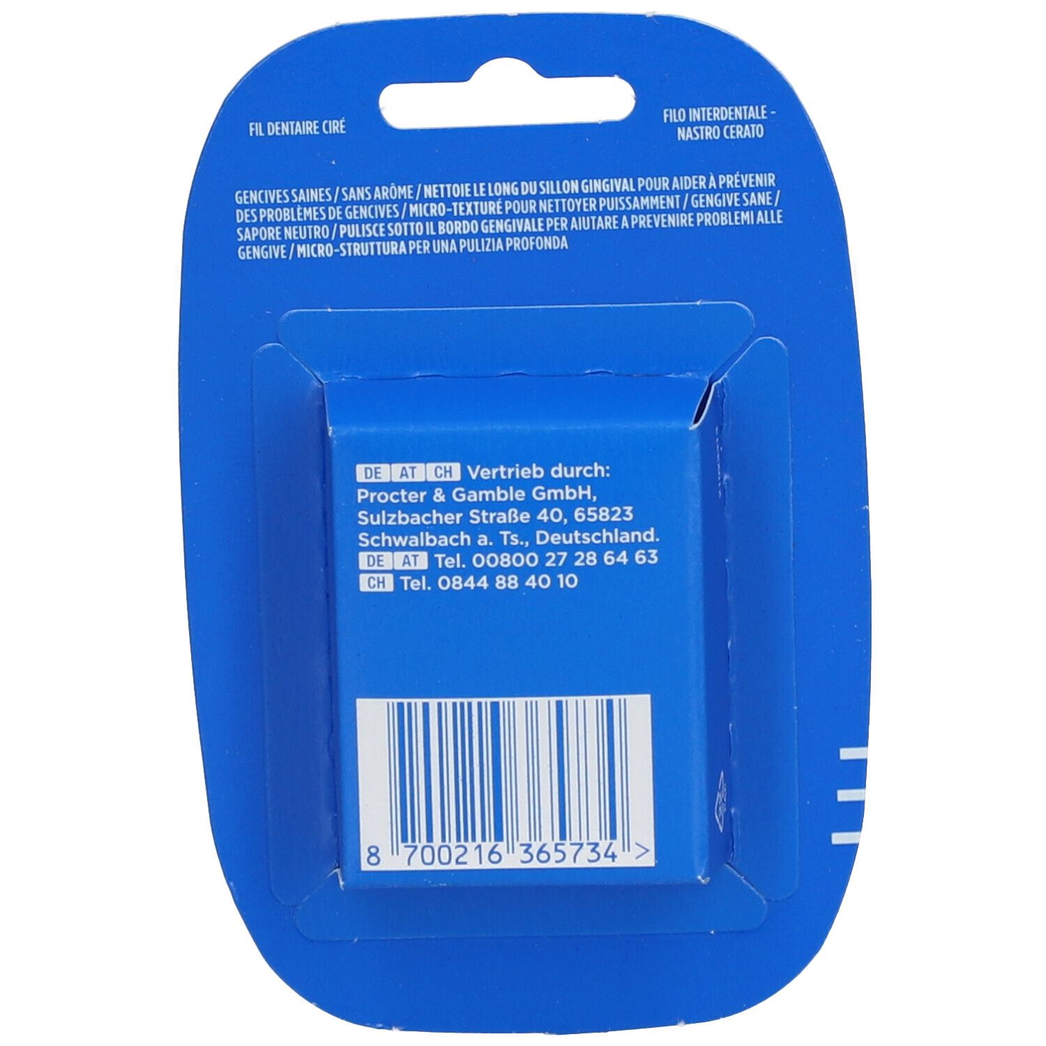 Rückseite der Zahnseide-Packung. Blaue Verpackung mit Produktinformationen und Barcode. Text: Vertrieb durch Procter & Gamble.