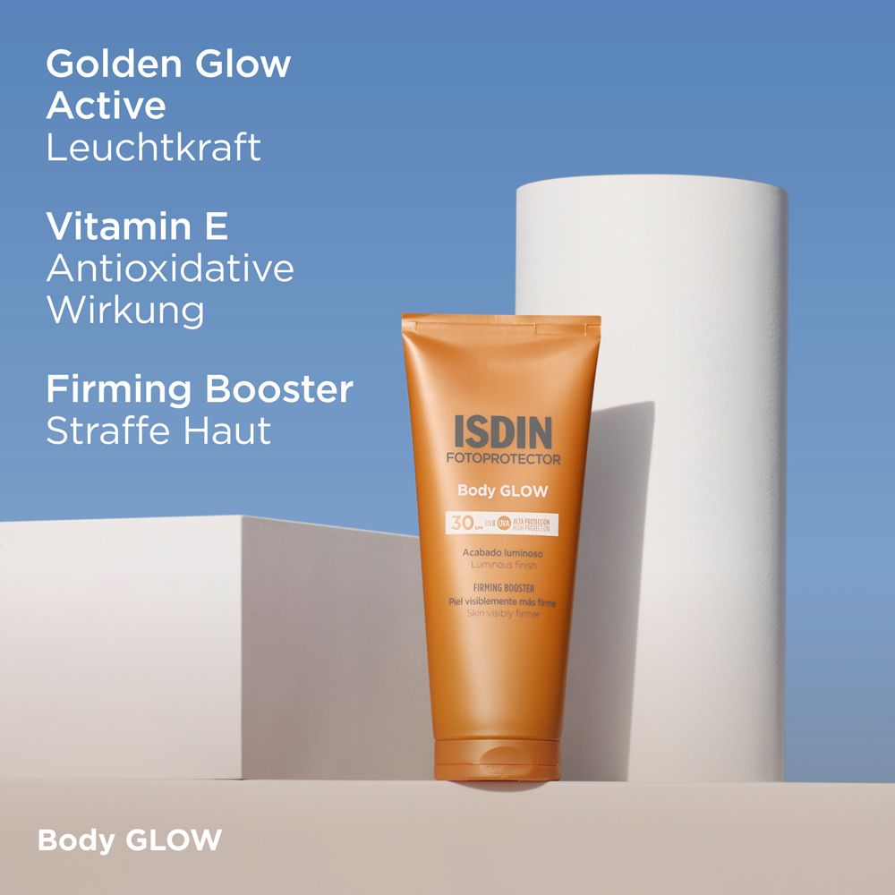 Tube ISDIN Body Glow. Text: Golden Glow, Vitamin E, Firming Booster.