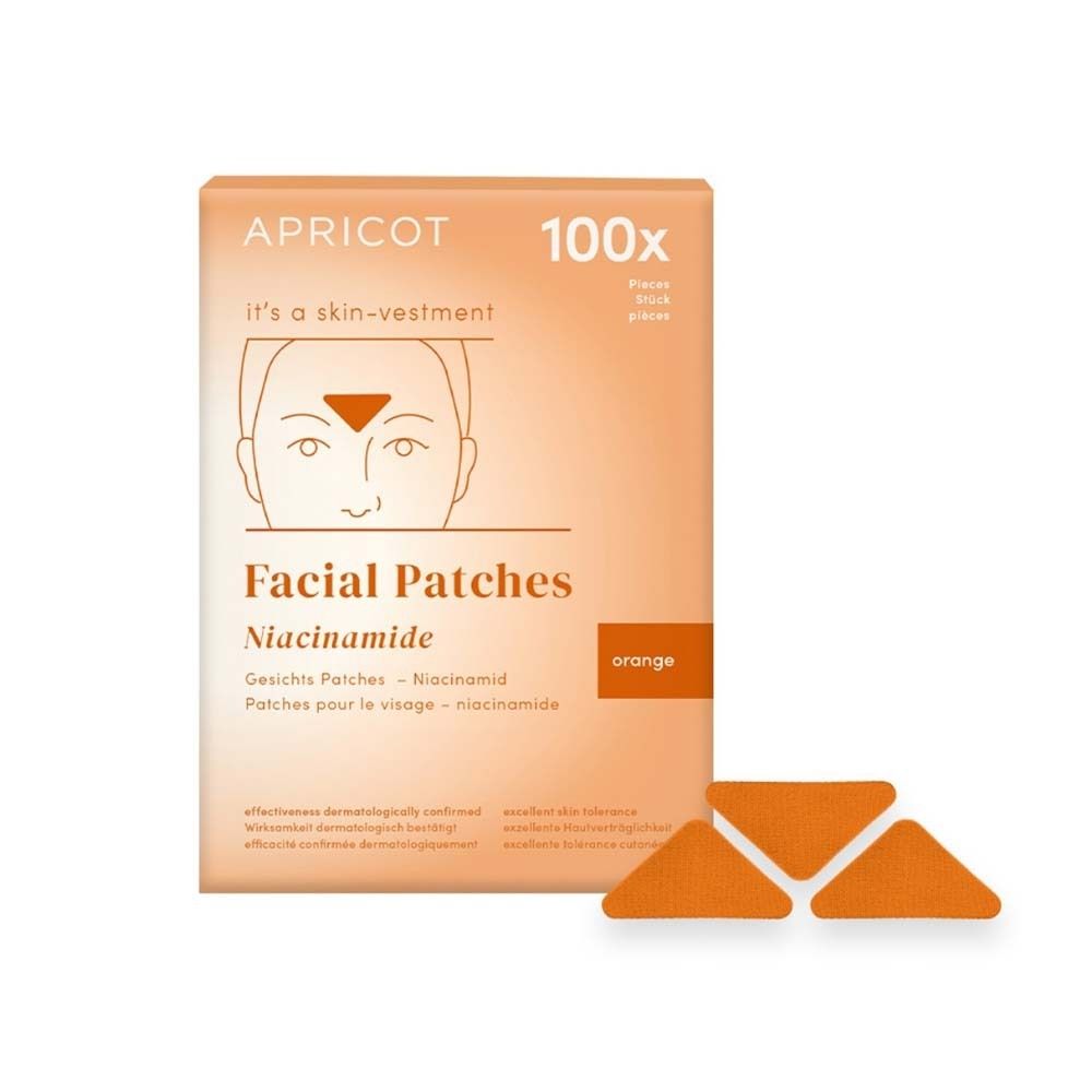 Verpackung mit Gesichtspatches. Marke APRICOT. Orangefarbene Patches mit Niacinamid. 100 Stück. Dreieckige Form.
