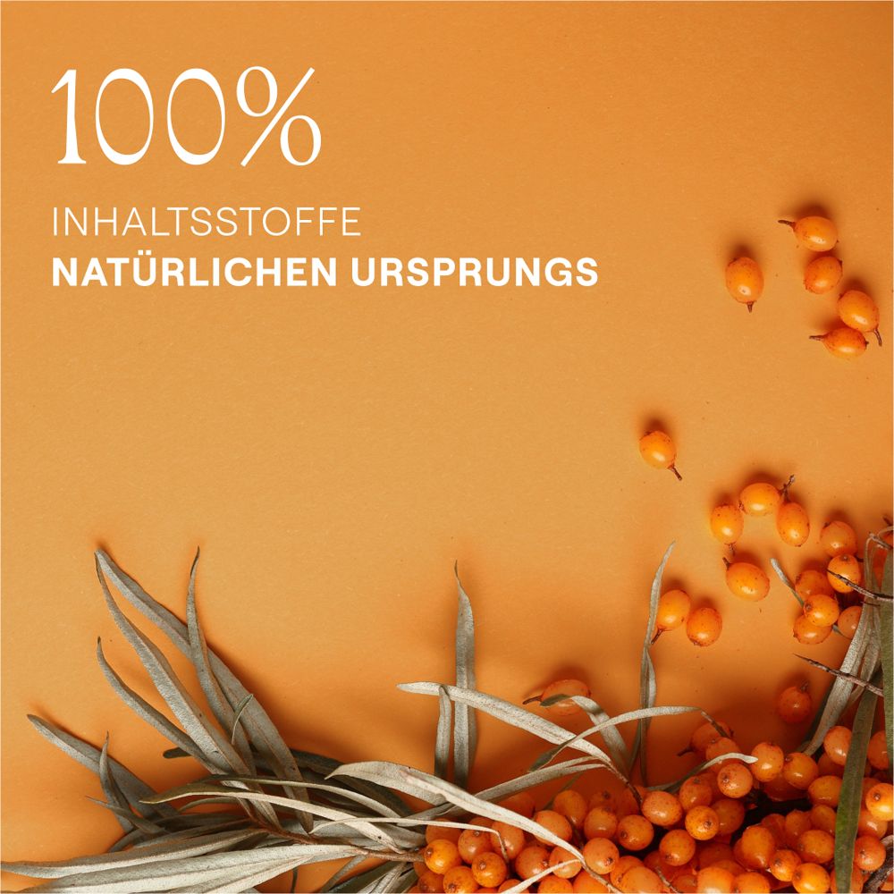 Sanddorn-Zweig und Blätter auf orangefarbenem Hintergrund. Text: 100% Inhaltsstoffe natürlichen Ursprungs.