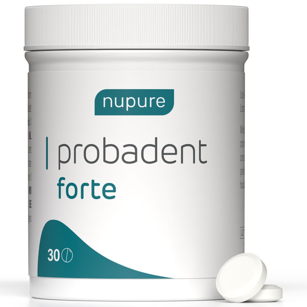 Weiße Dose mit nupure probadent forte. Zwei Tabletten liegen daneben.