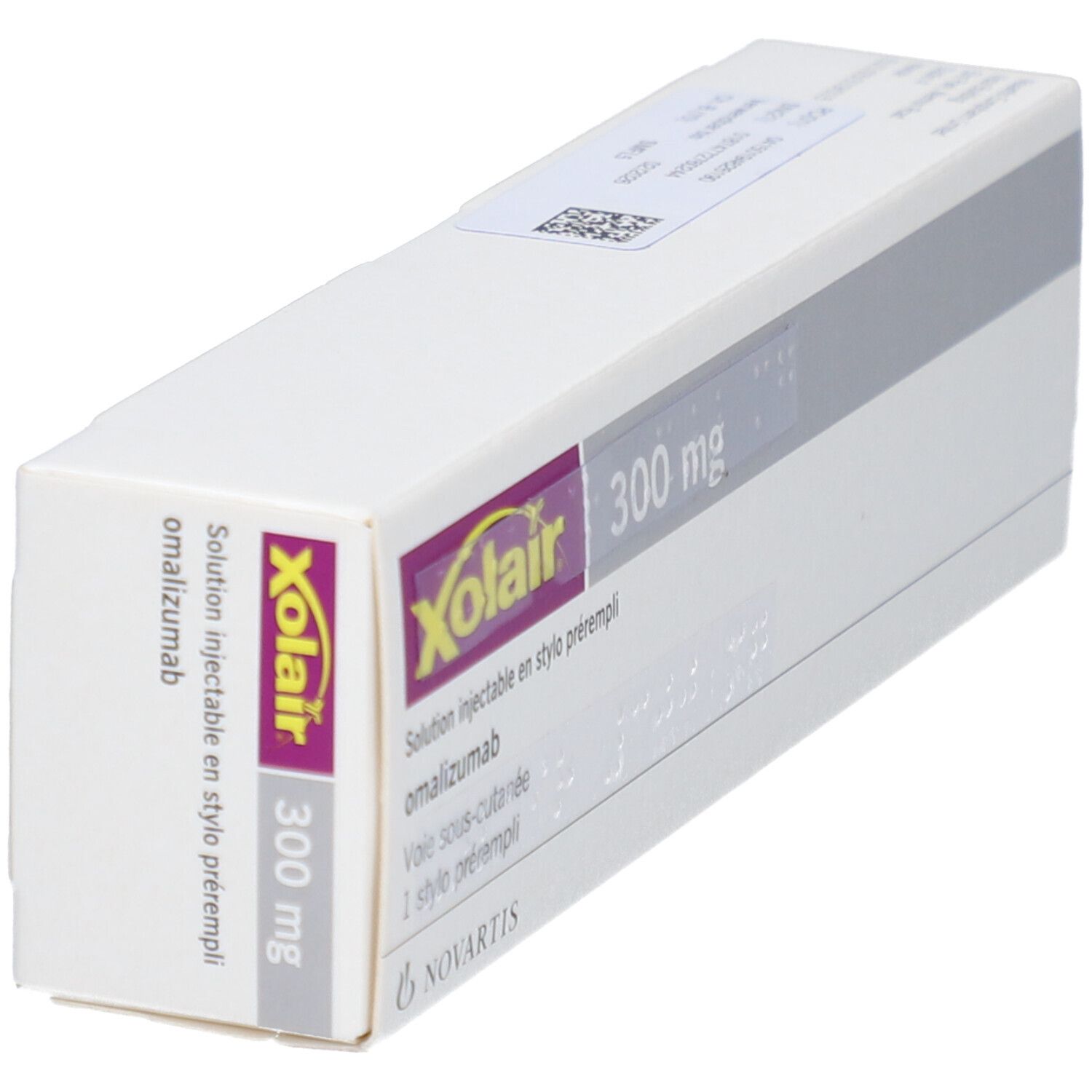 Schachtel mit Xolair-Logo und 300 mg Aufschrift. Enthält Text in Französisch. Novartis-Logo. Perspektivische Ansicht.