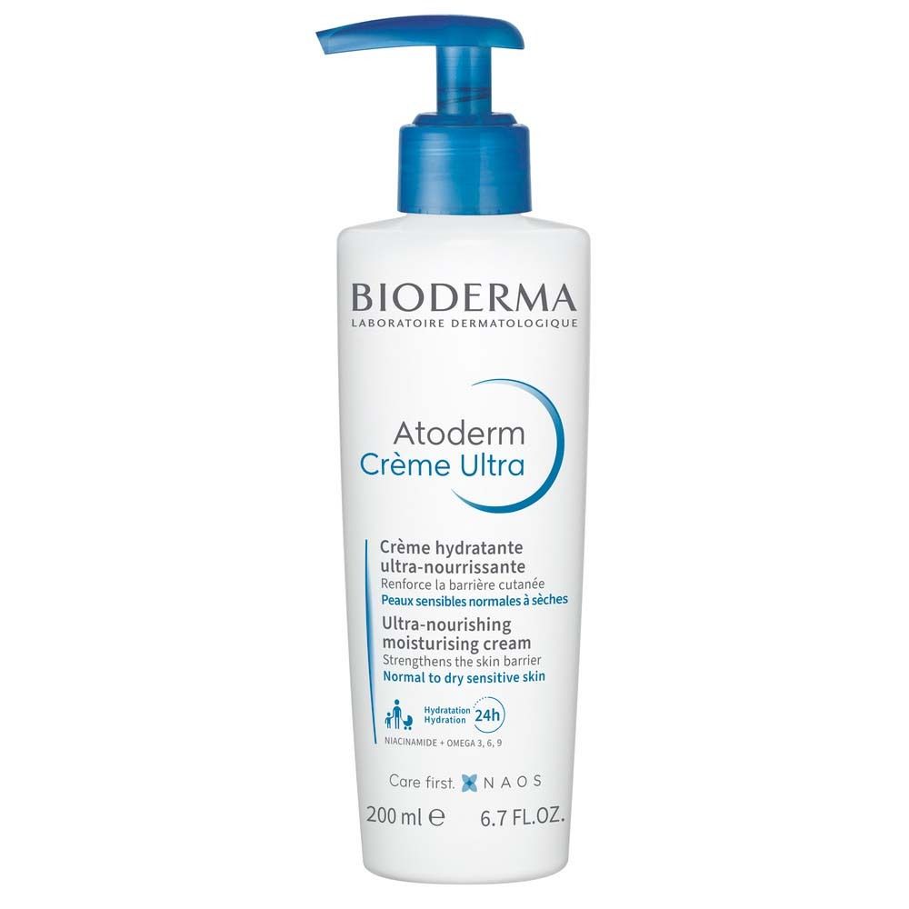 Weiße Flasche mit blauem Pumpkopf. Aufschrift: BIODERMA, Atoderm Crème Ultra. Text in Französisch und Englisch.