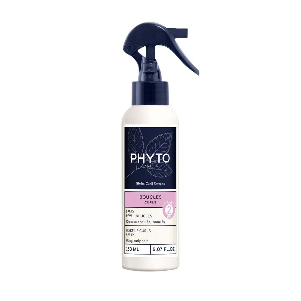 Stylingspray mit Sprühkopf. Weißes Fläschchen mit schwarzem Etikett und pinkfarbenem Streifen. Aufschrift: PHYTO PARIS, BOUCLES, 150 ml.